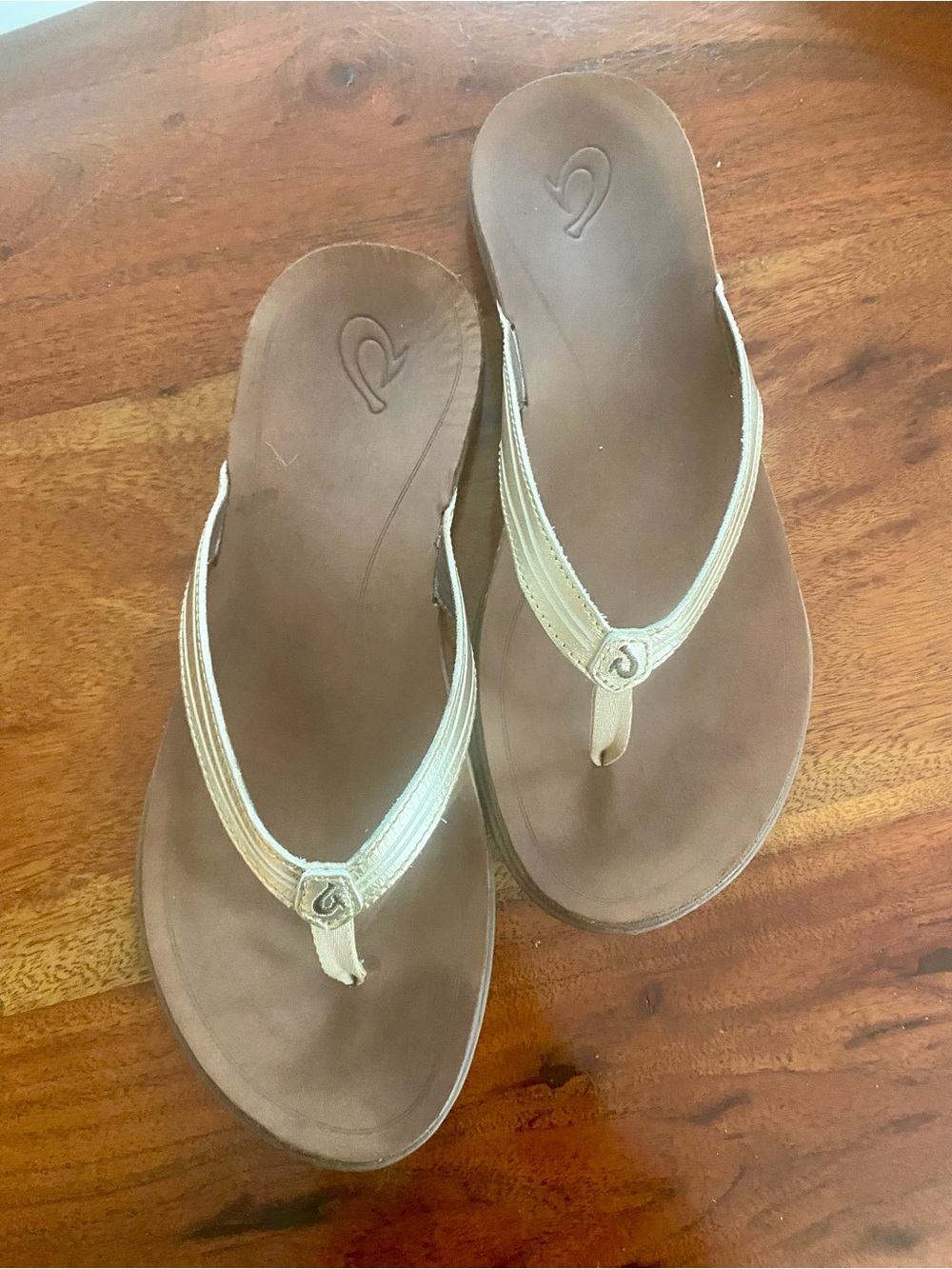 Olukai gold leather Flip Flops